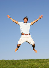 Obraz premium Young man jumping in air