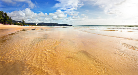 Tropical beach under blue sky. Thailand. Stitched Panorama