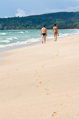 couple relaxing on beach