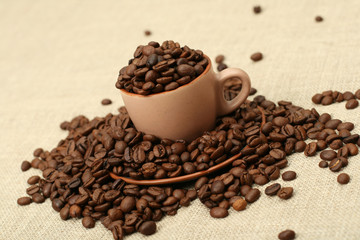 Full cup of coffee beans