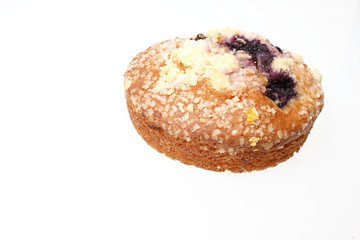 Blueberry muffin top on a white background