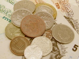 British Sterling pound currency banknotes and coins