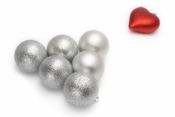 Christmas baubles, silvery balls and red heart