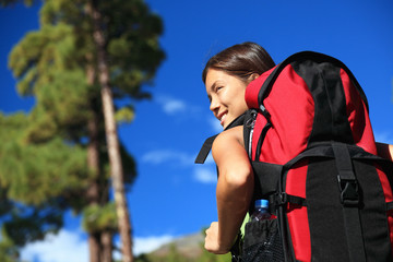 Woman hiking looking at view