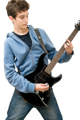 Teenager playing electric guitar on white background
