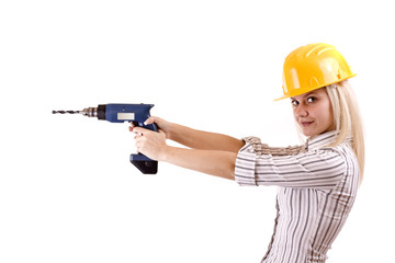 Young woman with drill machine