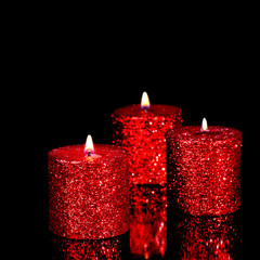 Three spangled candles in the dark - 27801406