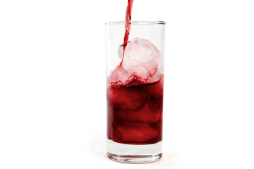 Red juice on ice cubes