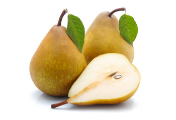 Yellow sliced pears with green leaf isolated