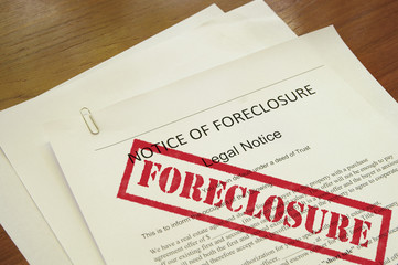 mortgage foreclosure document with red stamped text