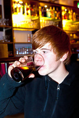 young boy is drinking