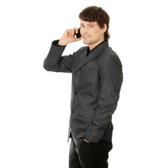 Fototapeta premium Happy business man using mobile phone