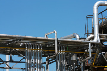 many steel pipes in oil refinery