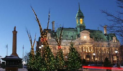 City Hall of Montreal and Christmas trees at night in winter