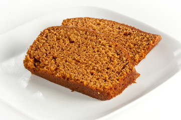 Two slices of freshly baked pumpkin bread