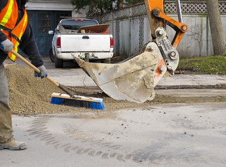Backhoe on residential street
