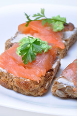 Sandwich with smoked salmon isolated