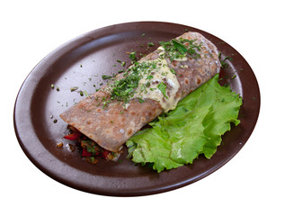 isolated rolled pancakes stuffed with vegetables.