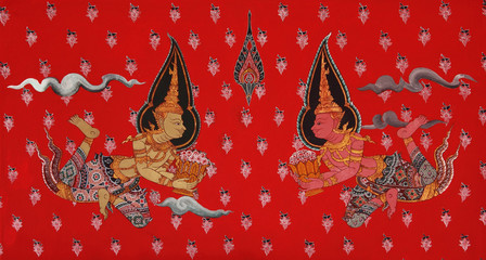 Traditional thai art painting on red wall in temple