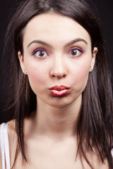 Woman with funny and surprise expression on face