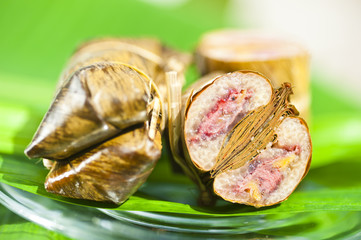 Khao tom Mad (Steamed Sticky Rice Pouches with Filling)