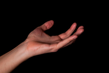 Fototapeta premium Male hand on black background