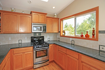Kitchen with cherry cabinets