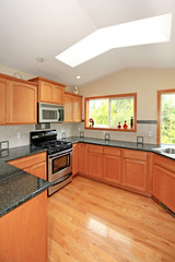 Kitchen with cherry cabinets