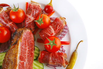 served beef rolls with chunk on white