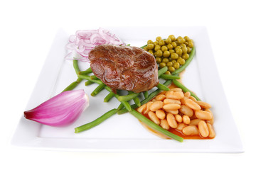fresh grilled meat medalion on beans