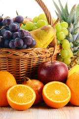 Composition with fruits and wicker basket