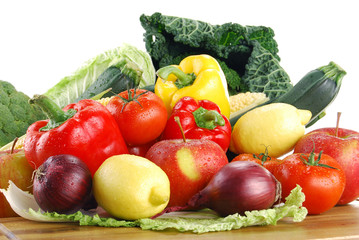 Composition with raw vegetables on kitchen table