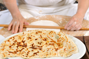 Obraz na płótnie Canvas Making gozleme, a traditional Turkish food.