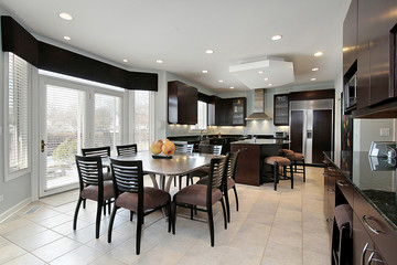 Kitchen with dark paneling