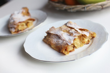Apple strudel dusted with sugar