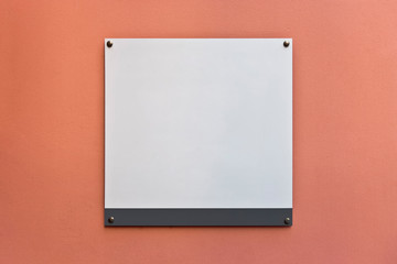 Fototapeta premium Blank billboard on orange city wall