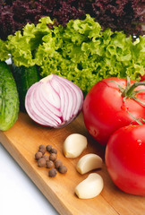 Fresh vegetables on wooden hardboard