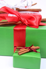 Christmas Gifts decorated with boes and cinnamon sticks