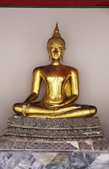 golden buddha in wat po,bangkok,thailand