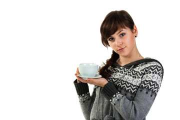 Beautiful girl holding a cup of tea