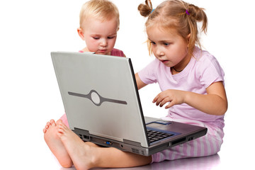 Children playing on laptop