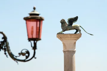 Fototapeten winged lion symbol of venice in Saint Mark's Square © itestro