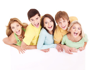 Group of happy people holding banner.