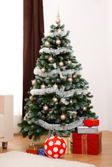 Fototapeta na wymiar Decorated Christmas tree with presents