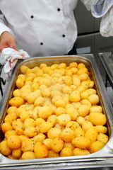 steaming freshly cooked potatoes in restaurant
