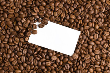 white card on coffee beans background