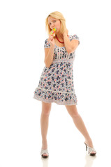 Attractive blonde eating lollipop