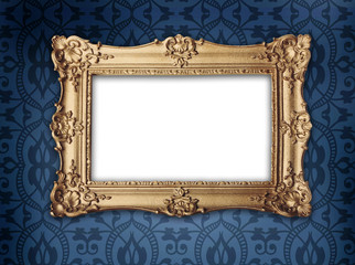 gold frame on victorian or regency style wallpaper