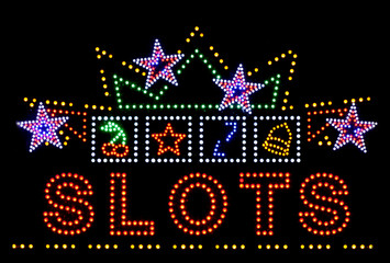 slots gambling neon sign