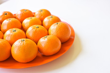 Oranges on a plate